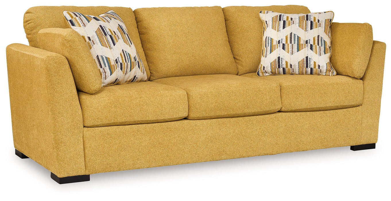 Keerwick - 4 Pc. - Sofa, Loveseat, Chair And A Half, Ottoman - Sunflower