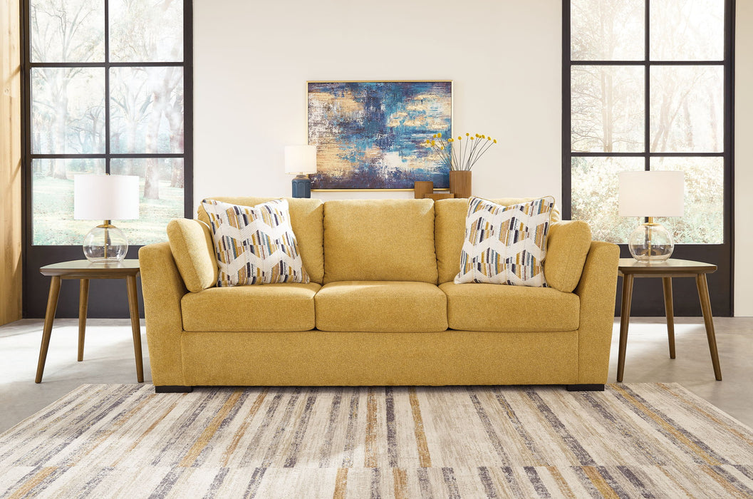 Keerwick - 4 Pc. - Sofa, Loveseat, Chair And A Half, Ottoman - Sunflower