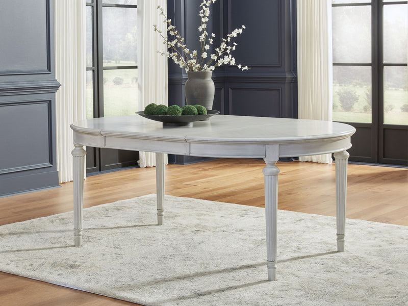 Montelaine - 8 Pc. - Dining Room Extension Table, 6 Side Chairs, Server - Antique White
